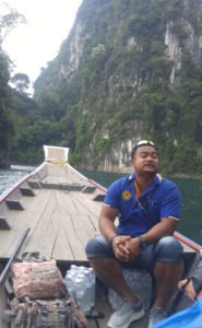 Jungle guide Pu in the boat