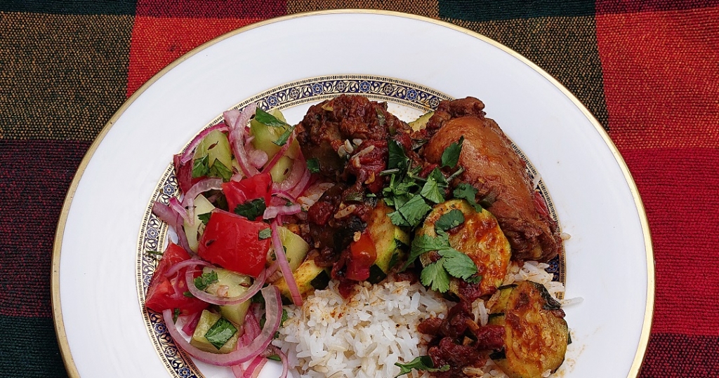 Pakistani karhai chicken & zucchini on rice serving suggestion